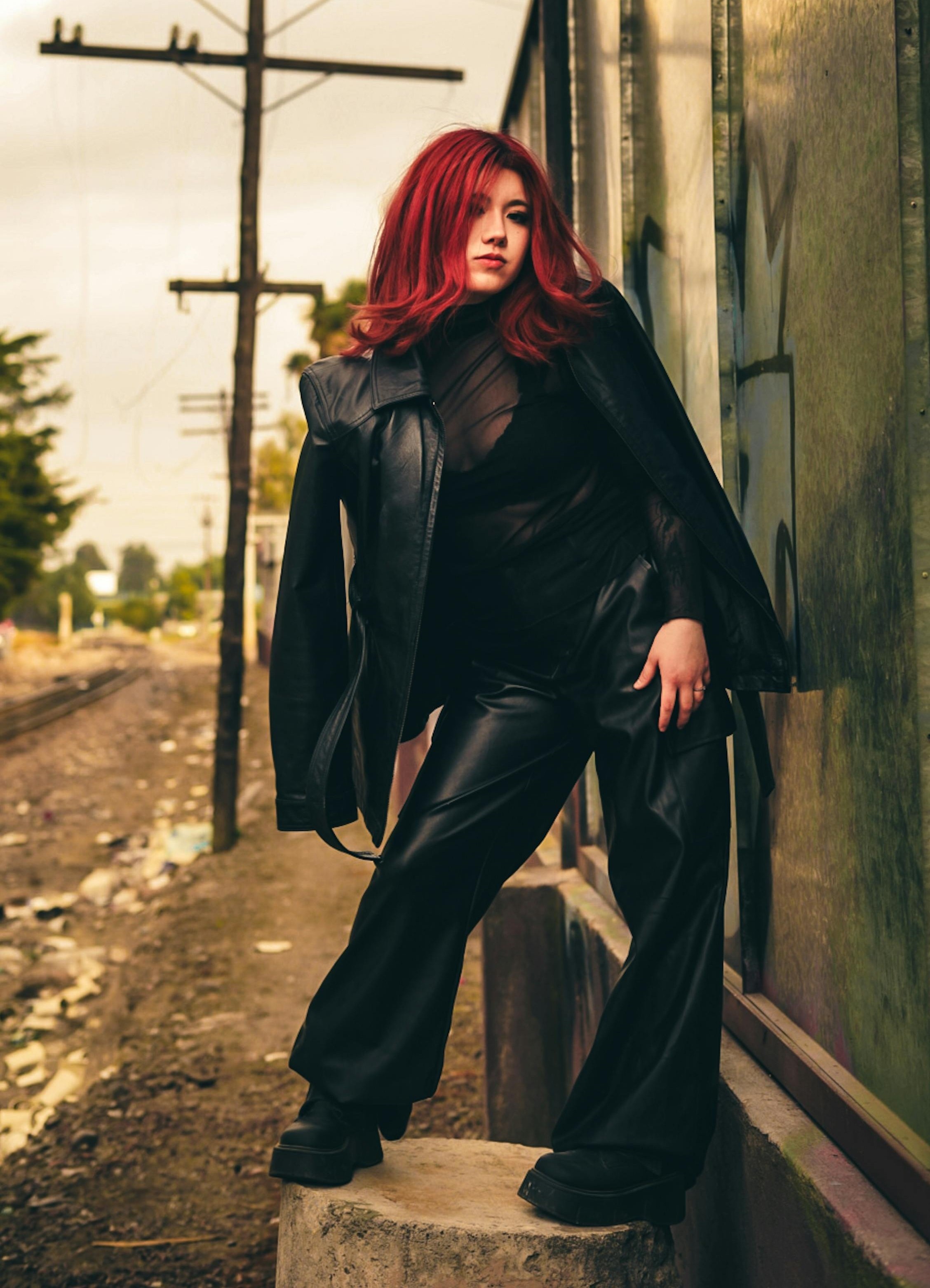 Alternative outfit basics including boots, layered tops, and dark bottoms